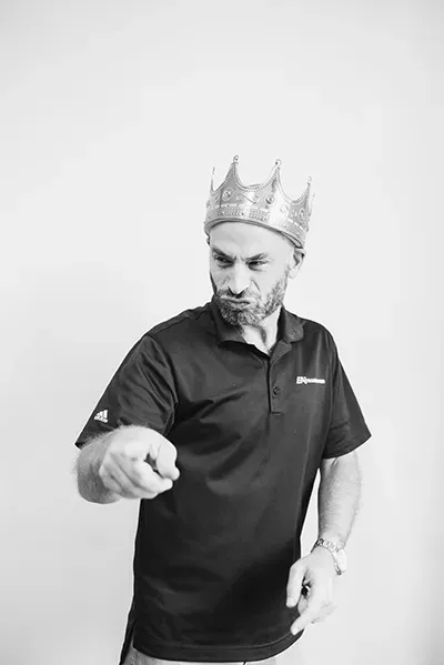 An EAi teammate wearing a crown