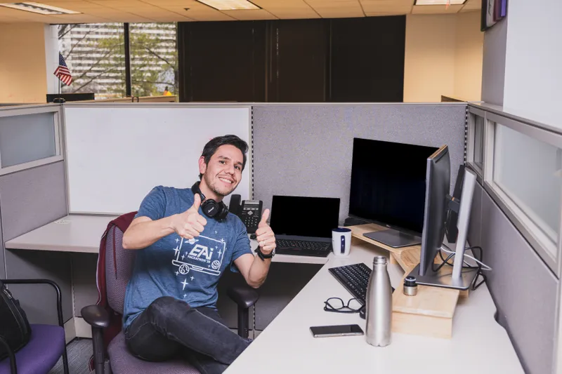 EAI Technologies team member at a company event